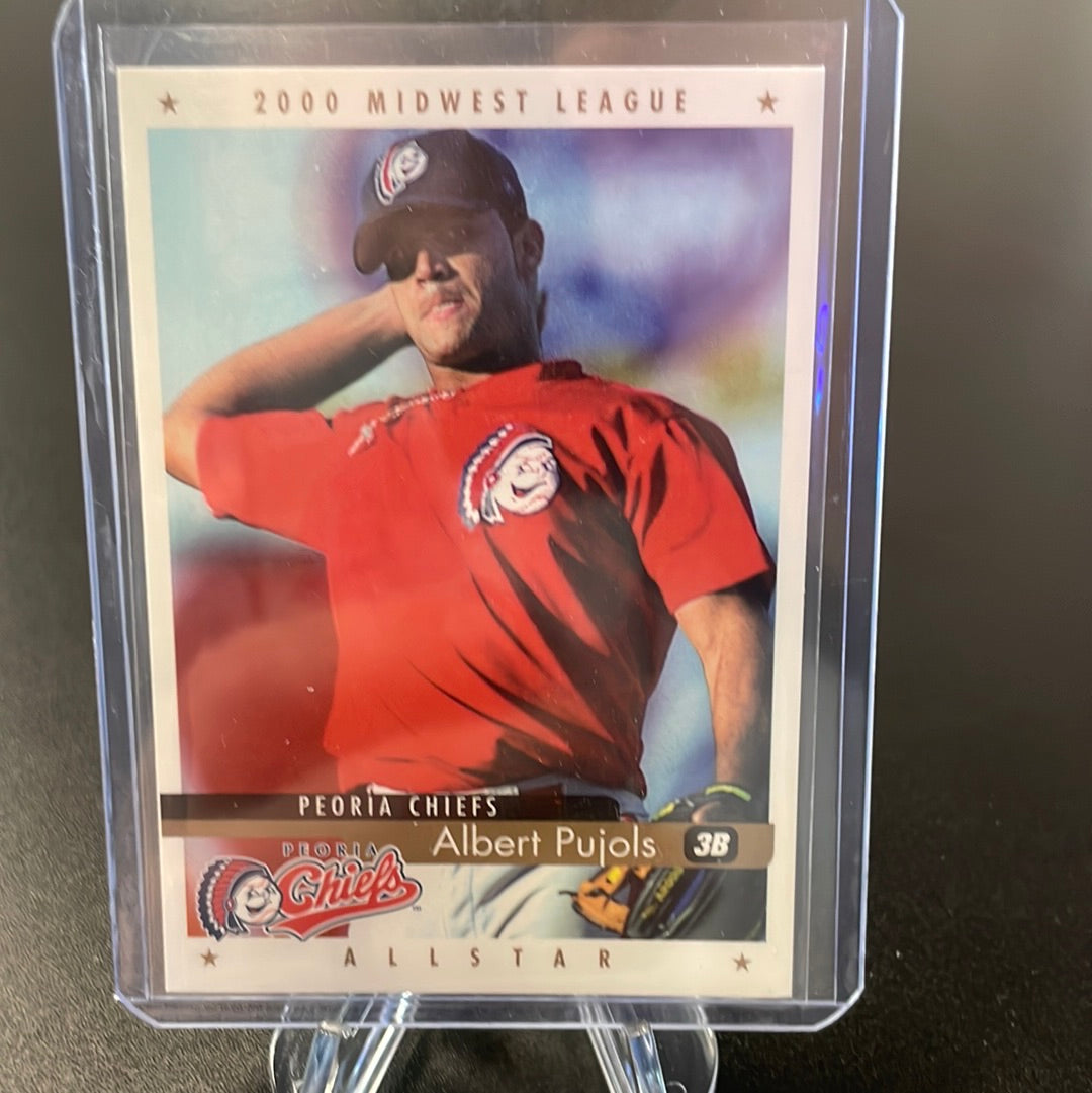 Albert Pujols, of the St. Louis Cardinals, and his son A.J. look up during  practice before the baseball All Star Game home run derby in Pittsburgh,  Monday, July 10, 2006.(AP Photo/Gene J., image size:1080x1081