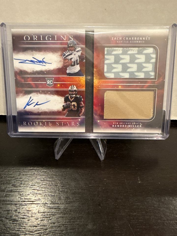 Zach Charbonnet/Kendre Miller 2023 Panini Origins Rookie Patch Auto Booklet Dual, 07/49