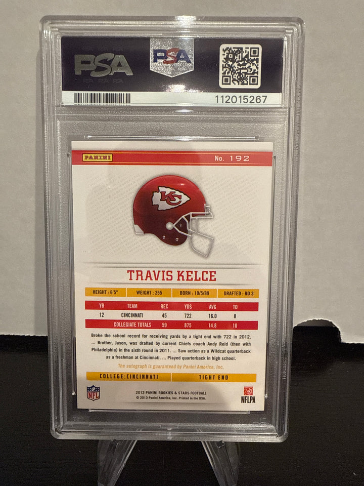 Travis Kelce 2013 Panini Rookies & Stars Team Logo Holofoil Rookie Auto, 17/32, PSA 9 Mint