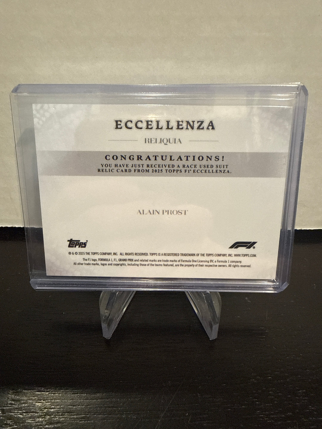 Alain Prost 2025 Topps Formula 1 Eccellenza Race Used Suit, 49/99