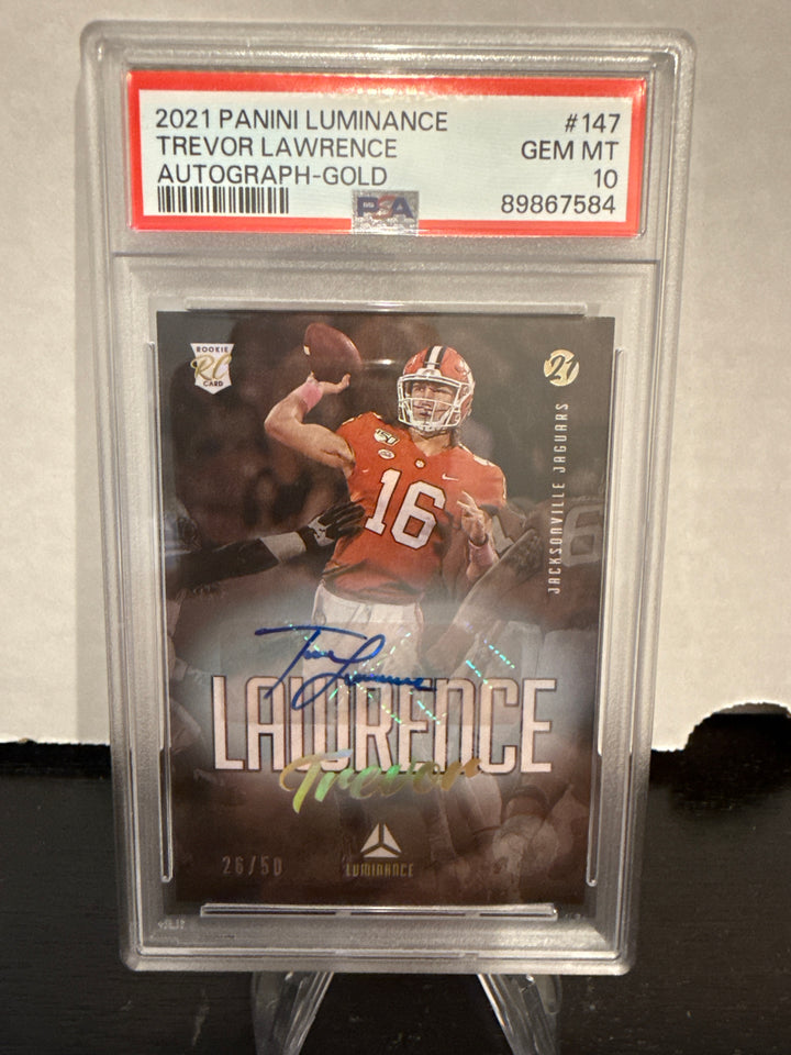 Trevor Lawrence 2021 Panini Luminance Rookie Auto Gold, 26/50, PSA 10 Gem Mint