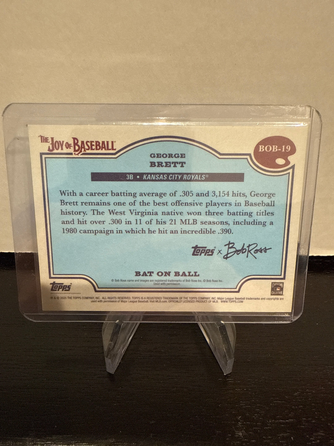 George Brett 2025 Topps Bob Ross The Joy of Baseball Bat on Ball Green Sap, 19/75