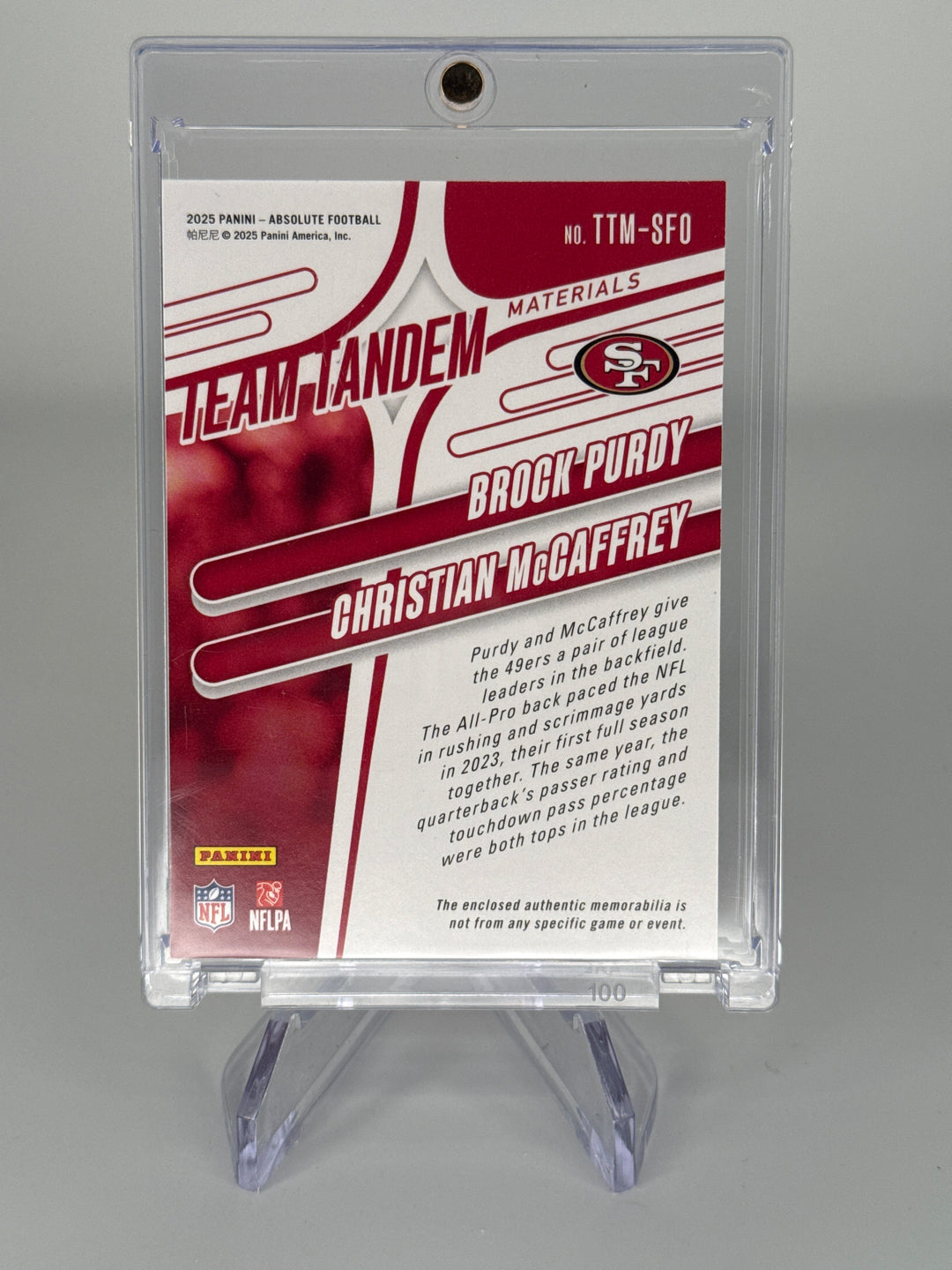 Brock Purdy/Christian McCaffrey 2025 Panini Absolute Team Tandem Materials Dual Relic, 86/99