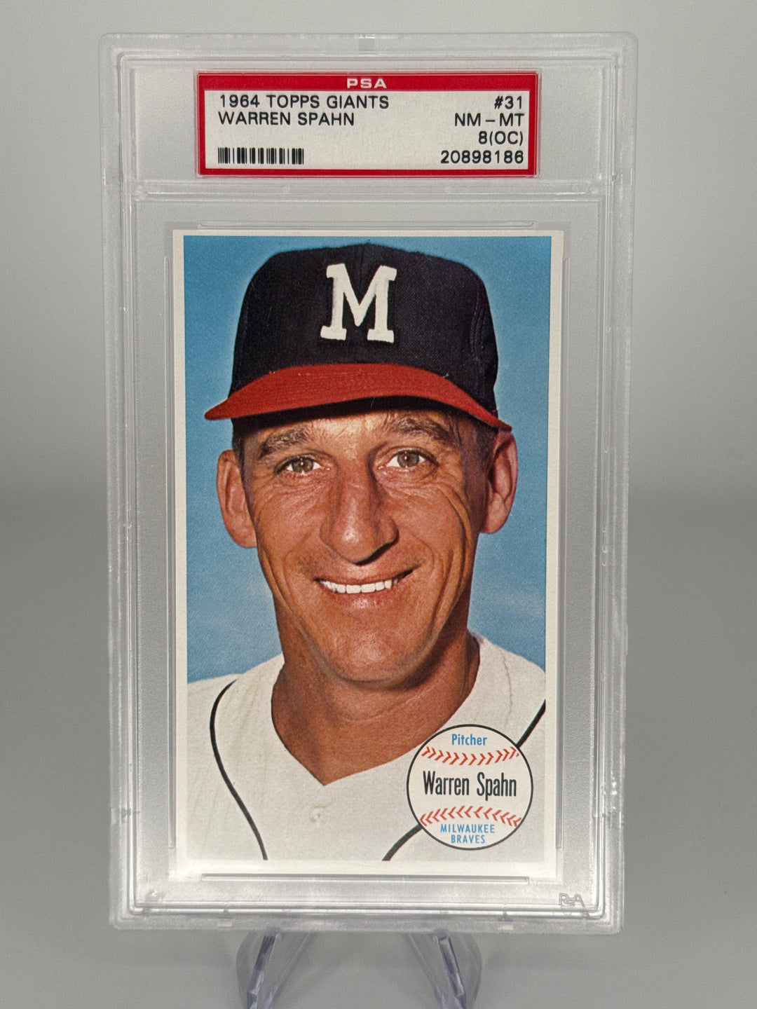 Warren Spahn 1964 Topps Giants, PSA 8(OC)