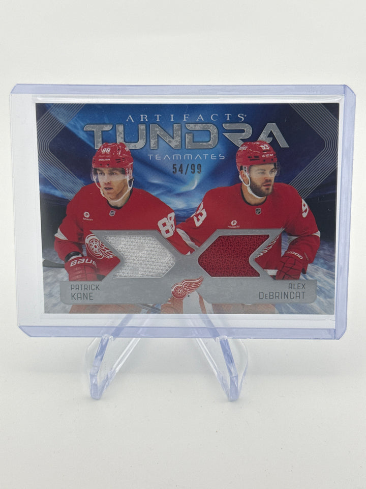 Patrick Kane/Alex DeBrincat 2025-2026 Upper Deck Artifacts Tundra Teammates Dual Relic, 54/99