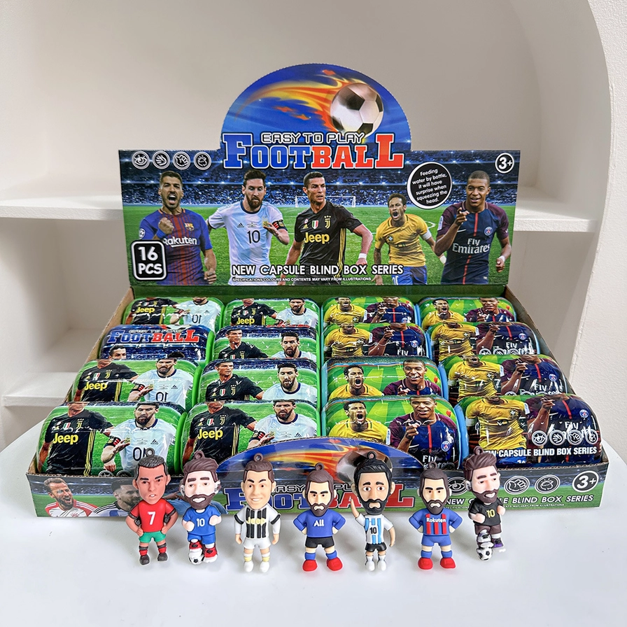 Collection of football player figurines in front of a display box on a white shelf.