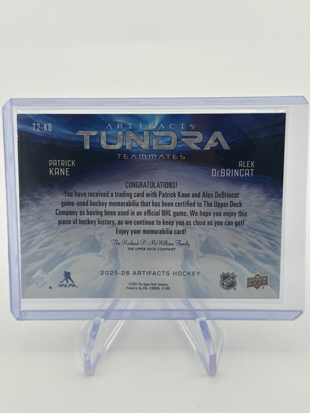 Patrick Kane/Alex DeBrincat 2025-2026 Upper Deck Artifacts Tundra Teammates Dual Relic, 54/99