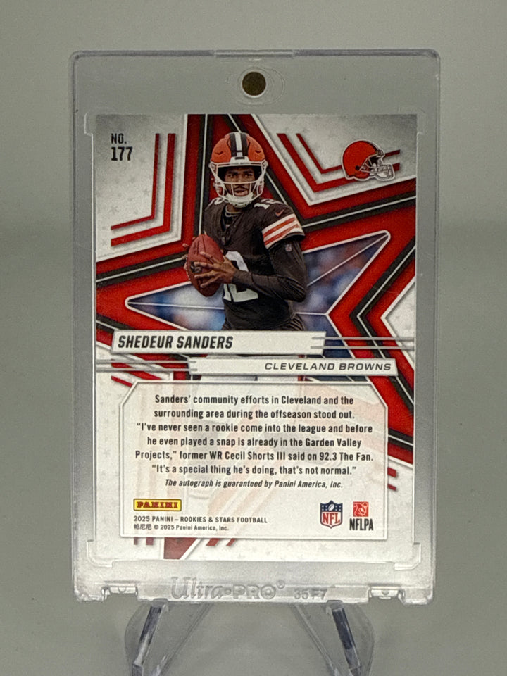 Shedeur Sanders 2025 Panini Rookies & Stars Orange Rookie Auto, 169/199