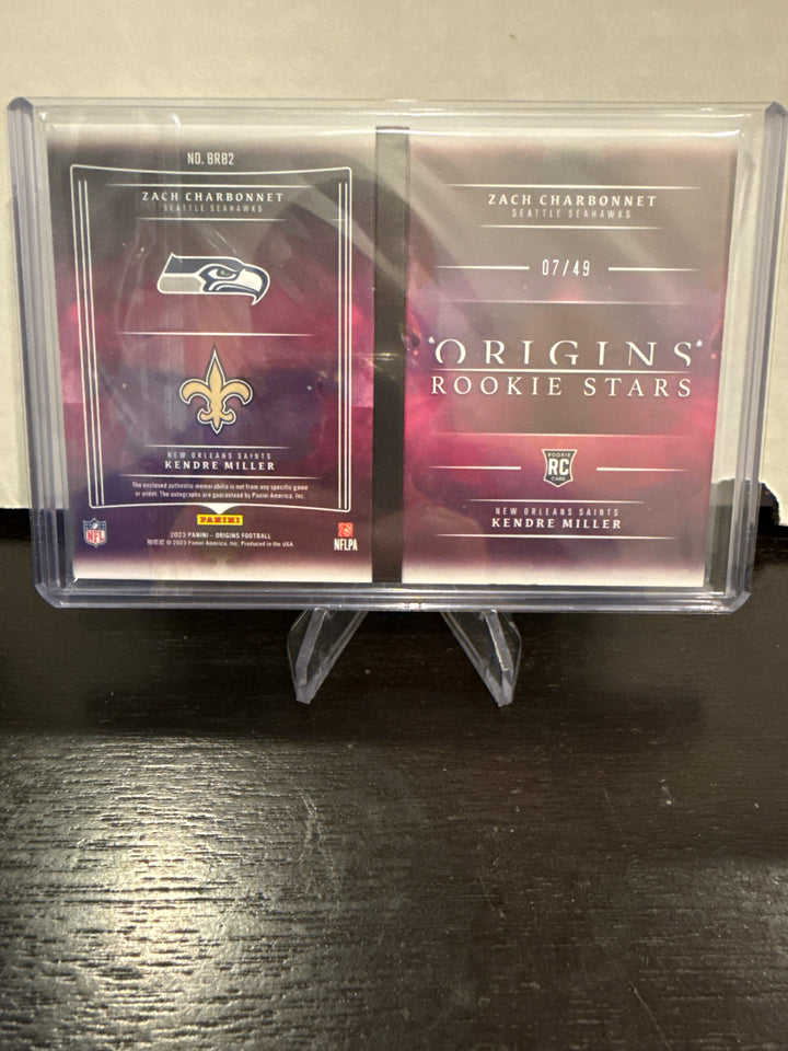 Zach Charbonnet/Kendre Miller 2023 Panini Origins Rookie Patch Auto Booklet Dual, 07/49