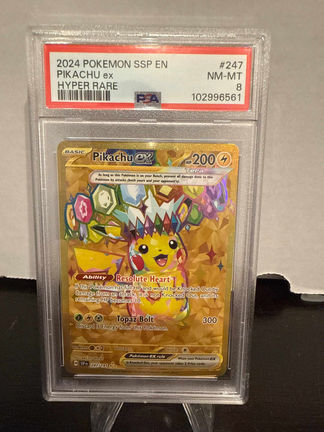 Pokémon TCG 2024 Pikachu EX Surging Sparks Gold Hyper Rare Full Art, 247/191, PSA 8