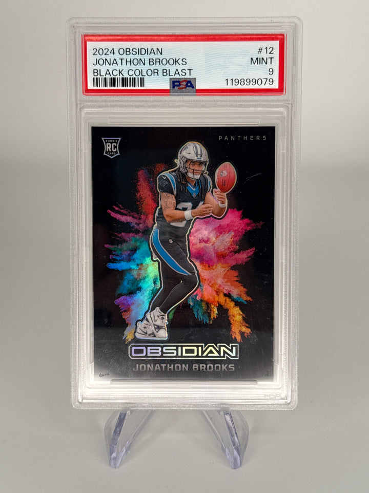 Jonathon Brooks 2024 Panini Obsidian SSP Case Hit Color Blast Rookie, PSA 9 Mint