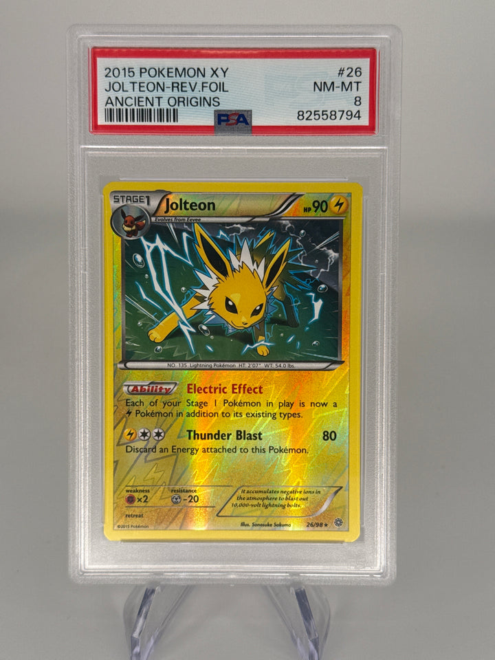 Pokemon TCG 2015 Jolteon XY Ancient Origins Reverse Foil, 26/98, PSA 8