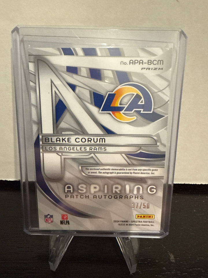 Blake Corum 2024 Panini Spectra Rookie Patch Auto Blue Neon, 37/50