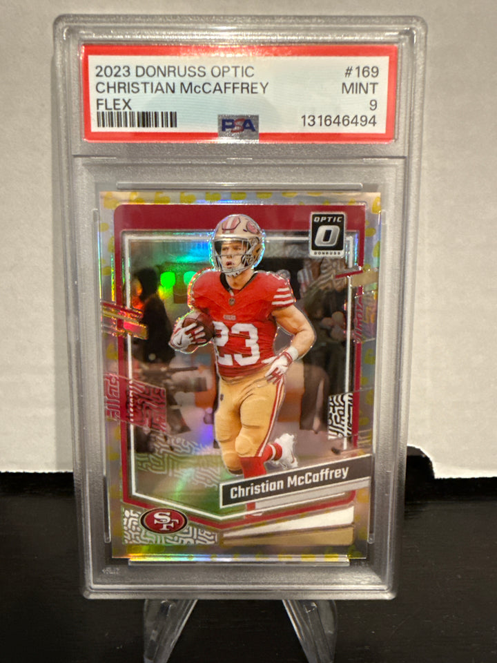 Christian McCaffrey 2023 Panini Donruss Optic Flex Emoji, 143/149, PSA 9 Mint