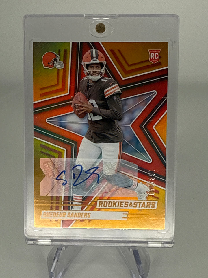 Shedeur Sanders 2025 Panini Rookies & Stars Orange Rookie Auto, 169/199