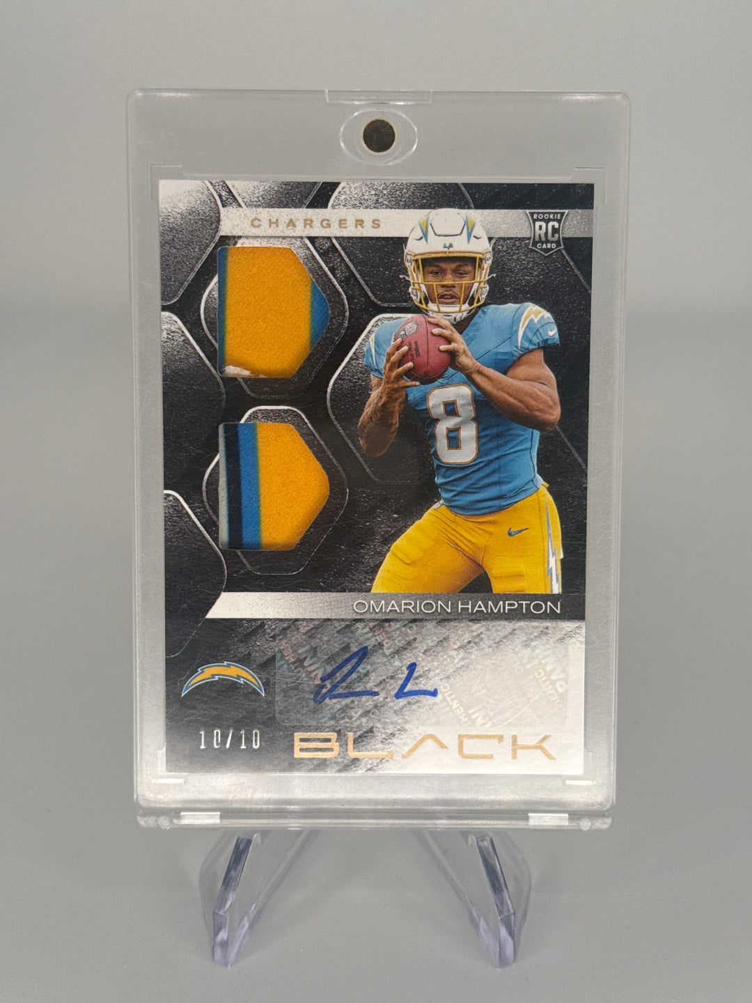 Omarion Hampton 2025 Panini Black Rookie Patch Auto Gold, 10/10